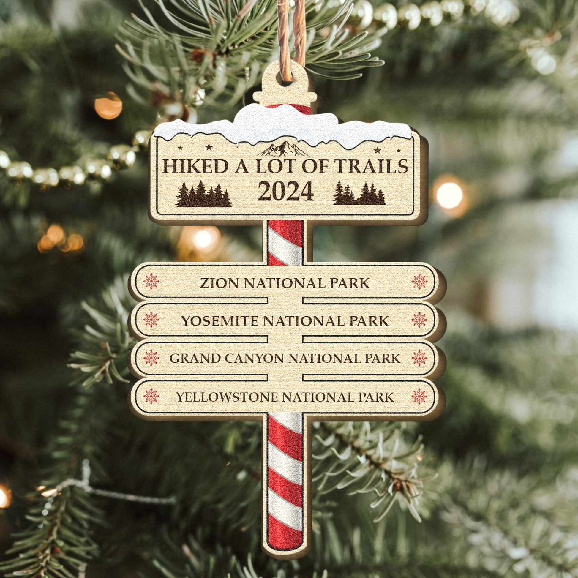 https://macorner.co/cdn/shop/files/Hiked-A-Lot-Of-Trails-Hiking-Camping-Lovers-Personalized-Wooden-Ornament_1.jpg?v=1696331694&width=1946