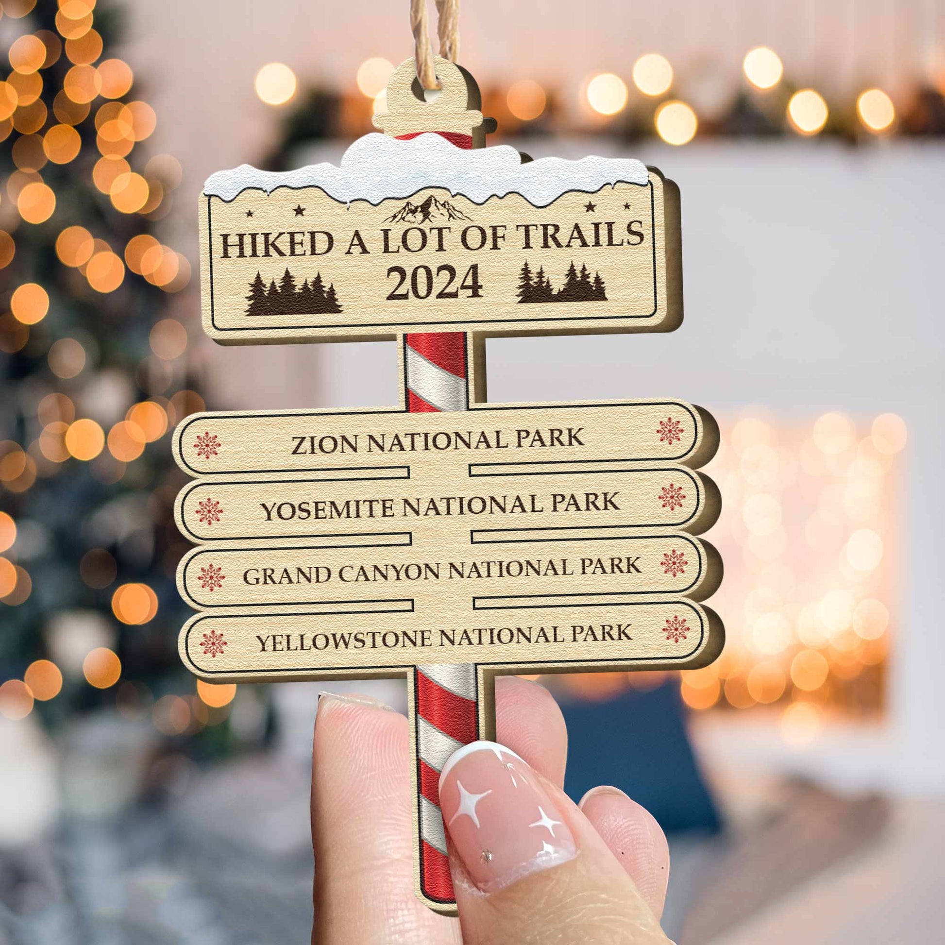 https://macorner.co/cdn/shop/files/Hiked-A-Lot-Of-Trails-Hiking-Camping-Lovers-Personalized-Wooden-Ornament_2.jpg?v=1696331694&width=1946