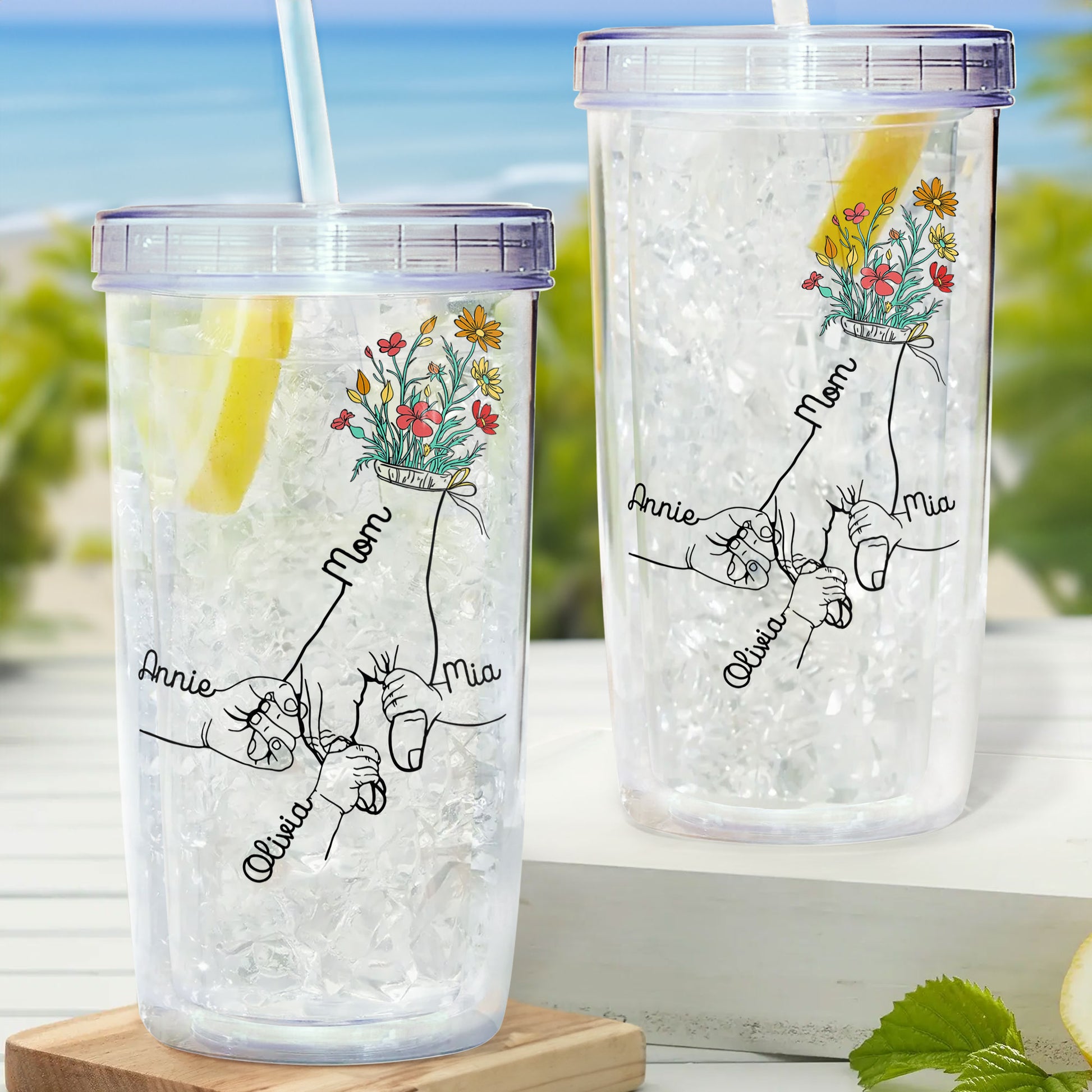 https://macorner.co/cdn/shop/files/Holding-Mom_s-Hand-Wild-Floral-Personalized-Acrylic-Insulated-Tumbler-With-Straw_2.jpg?v=1690529165&width=1946