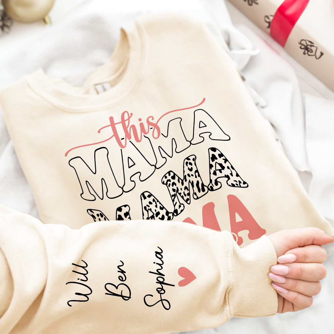 This Mama Wears Her Heart On Her Sleeve - Up To 12 Names - Personalized Sweatshirt