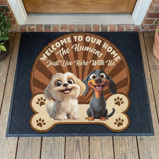 Welcome To Our Home - The Humans Just Live Here With Us - Personalized Doormat