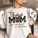 This Football Mom Wears Her Heart On Her Sleeve - Personalized Sweatshirt